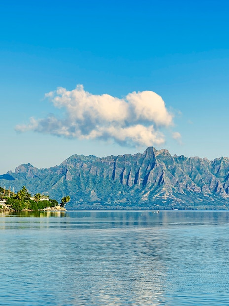 Kualoa Ranch mountain range and ocean view in Hawaii.