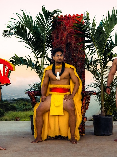 Mauka Warriors performing a cultural play with traditional attire and props.