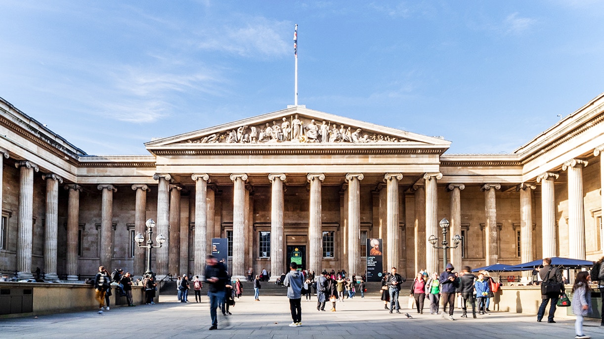 British Museum exterior with visitors in front, London.