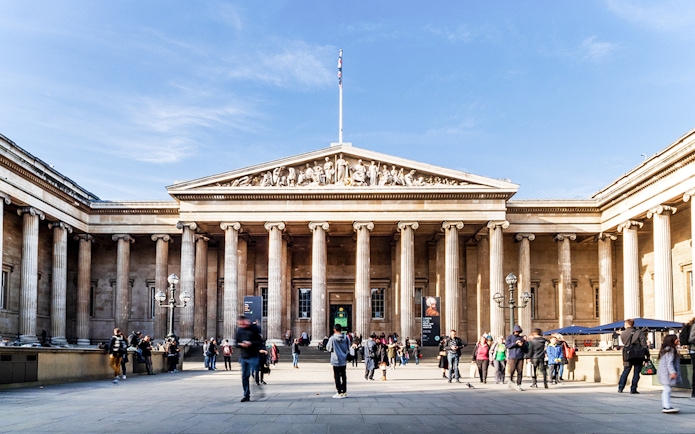 British Museum exterior with visitors in front, London.