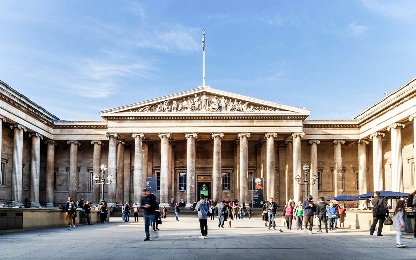 British Museum exterior with visitors in front, London.