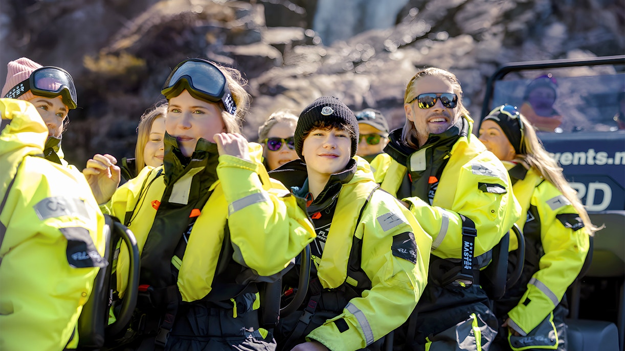 RIB boat on Lysefjord Safari with guide and guest exploring Norwegian fjord.