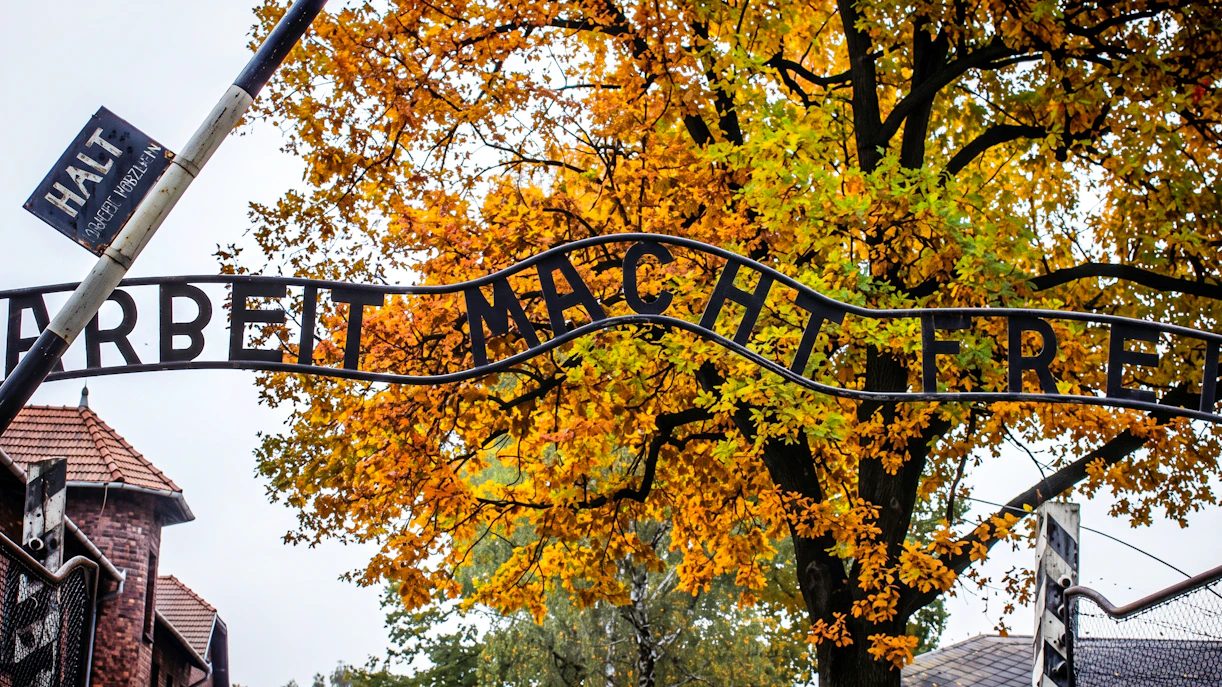 Entrance gate with "Arbeit Macht Frei" at Auschwitz-Birkenau, Krakow.