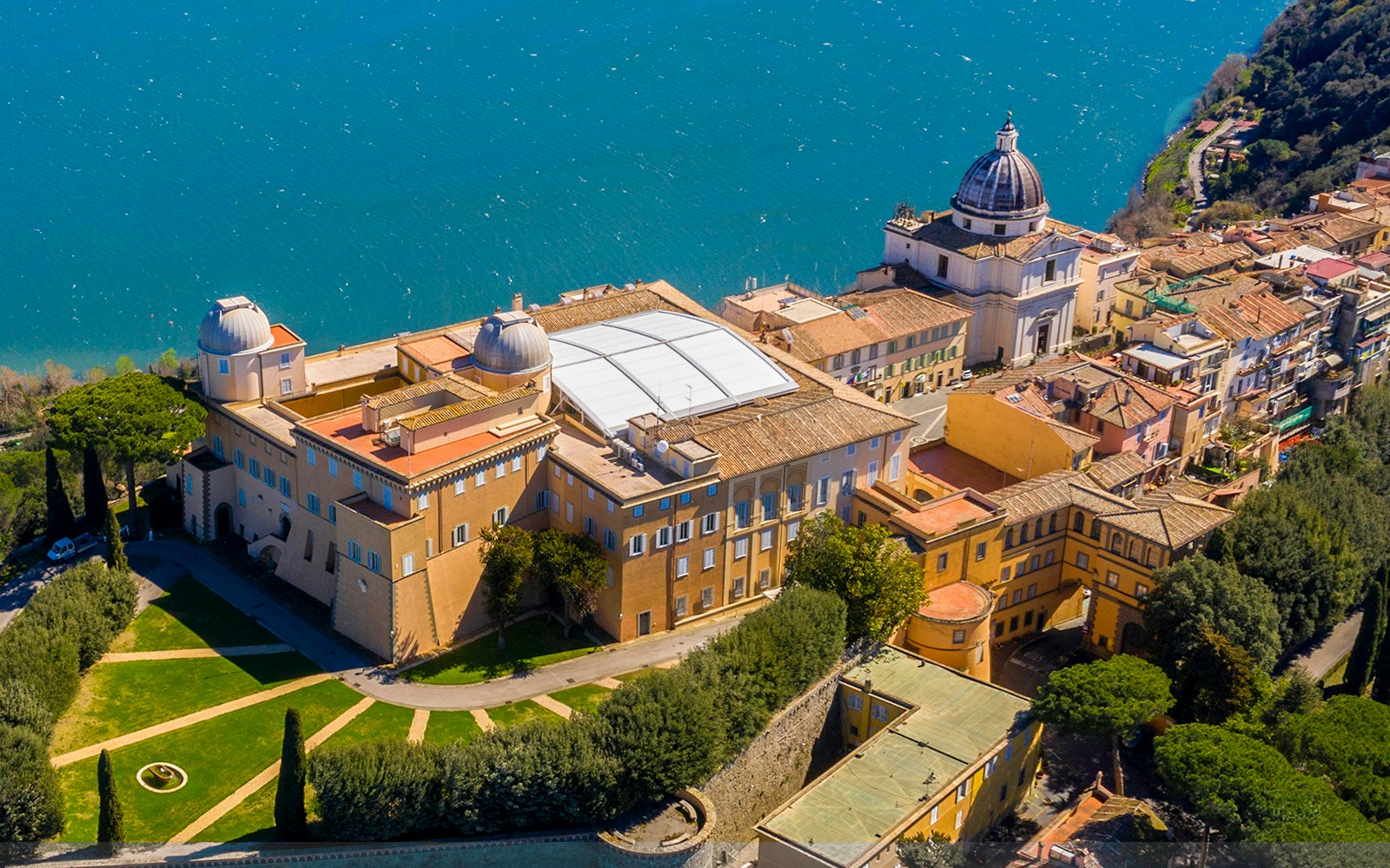 Aerial view of Castel Gandolfo overlooking Lake Albano in Rome.