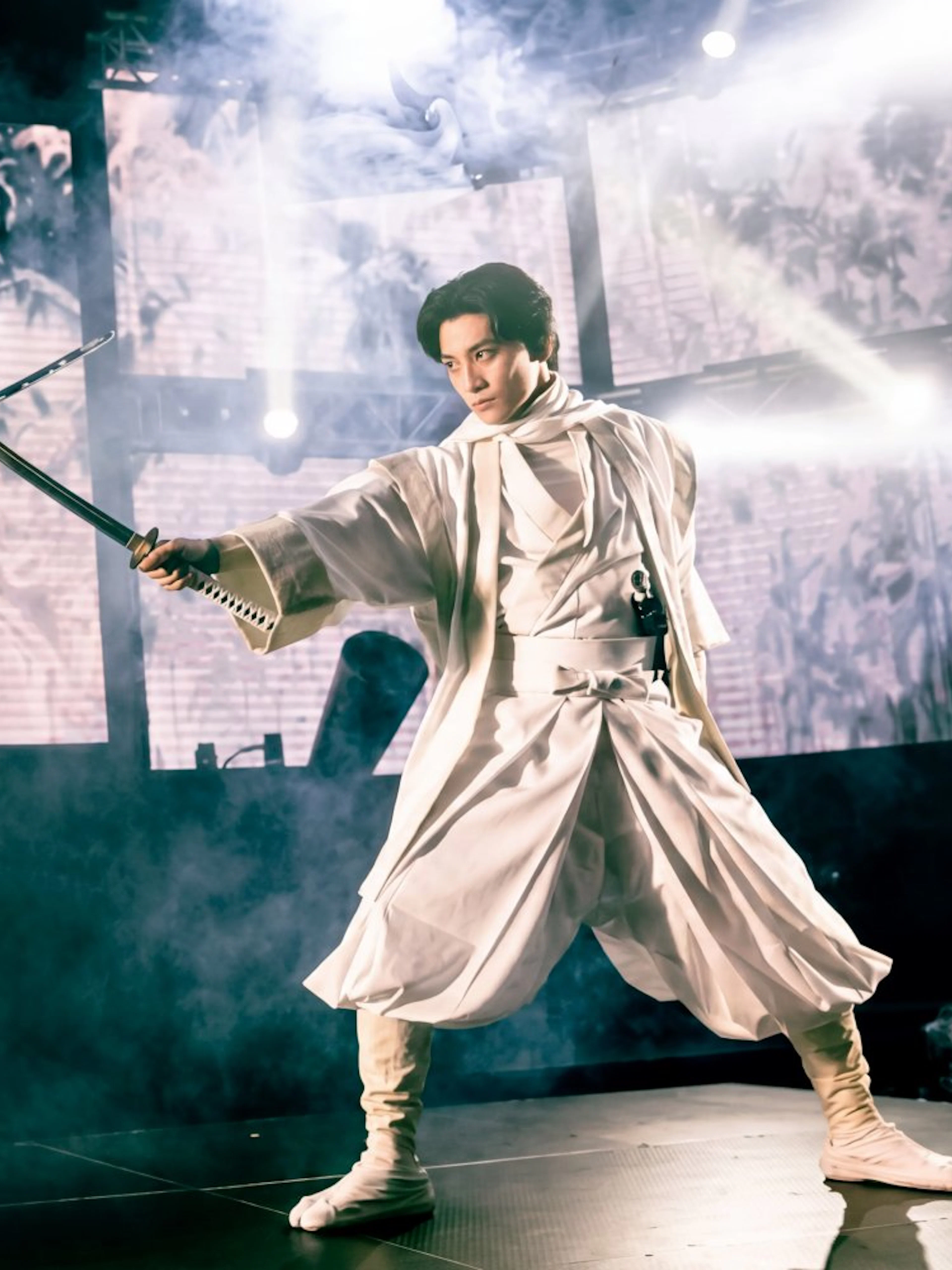 Samurai duel on stage in Tokyo, blending traditional and modern elements.