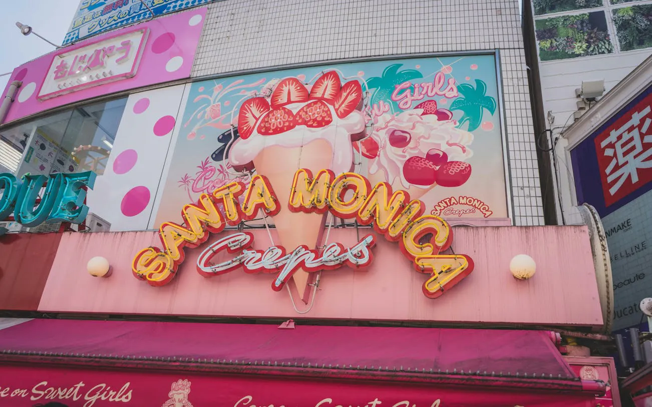Santa Monica Crepes shop sign on Cat Street, Tokyo, during Shibuya Sky walking tour.