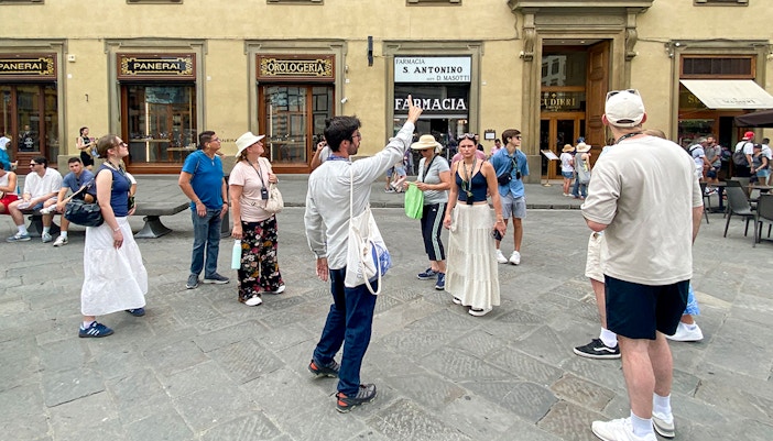 Visitors with a guide on a Florence City Centre & Cathedral Walking Tour