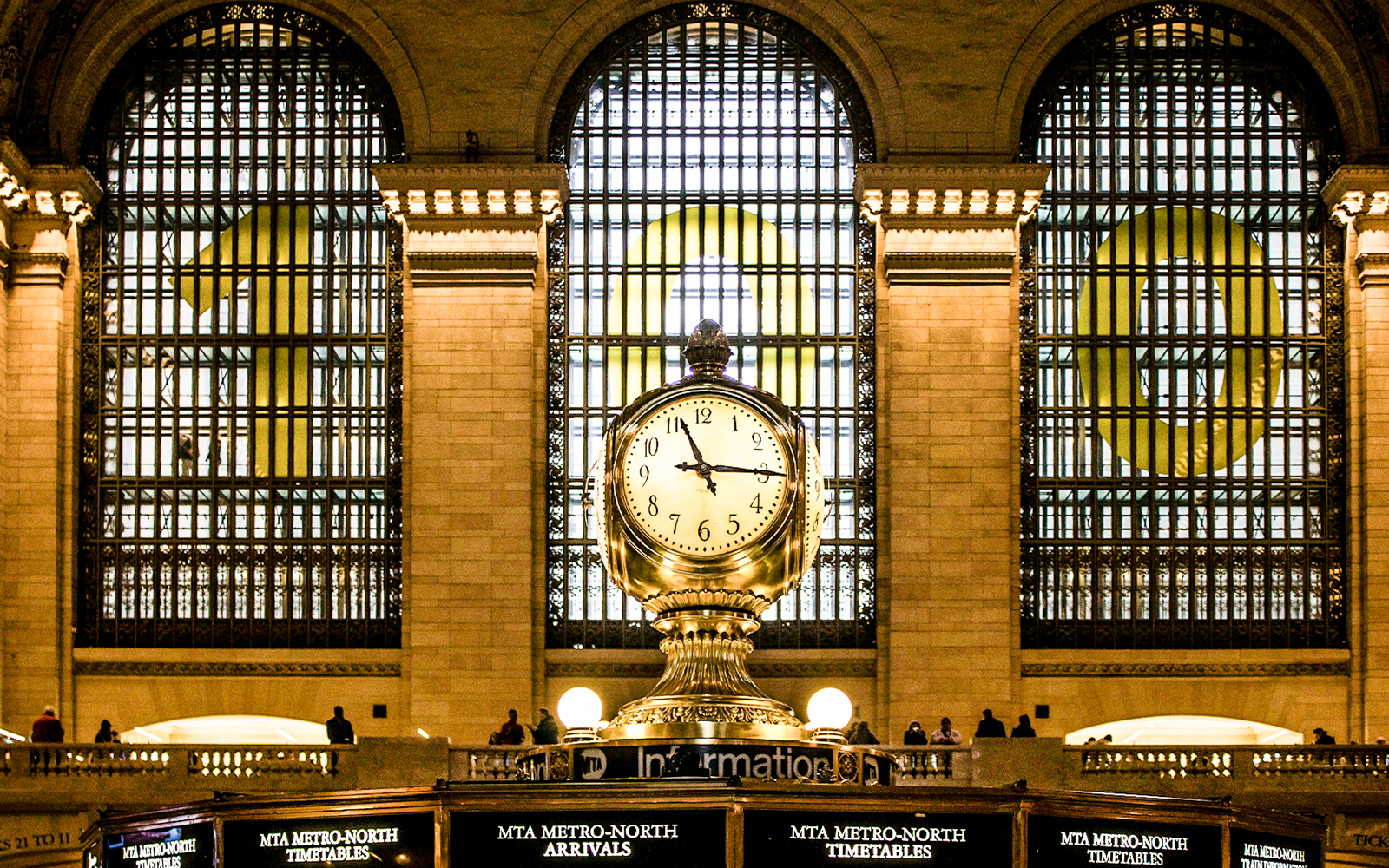 Grand Central Station gold clock at information center, New York.