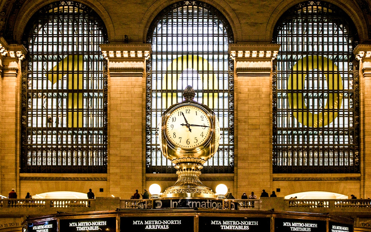 Grand Central Station gold clock at information center, New York.