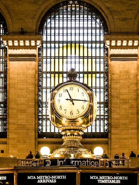 Grand Central Station gold clock at information center, New York.