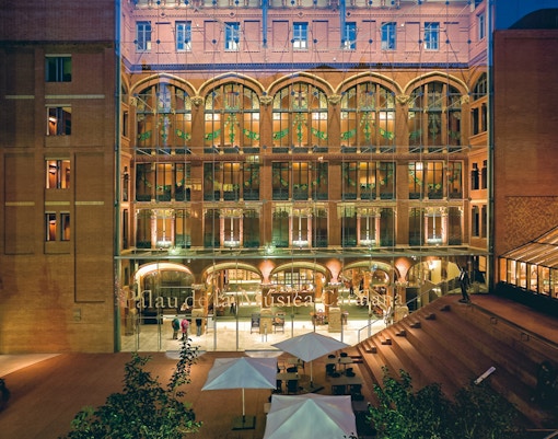 Palau de la Música Catalana entrance with illuminated facade in Barcelona.
