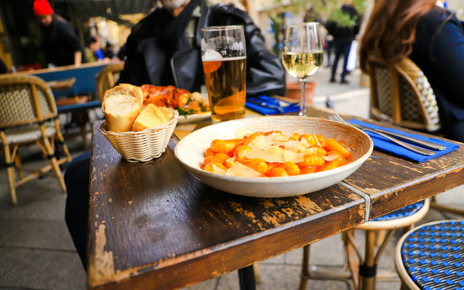 Gnocchi and bread on a café table at Place Garibaldi, Nice.