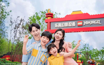 Family at LEGO NINJAGO entrance, LEGOLAND Shanghai Resort.