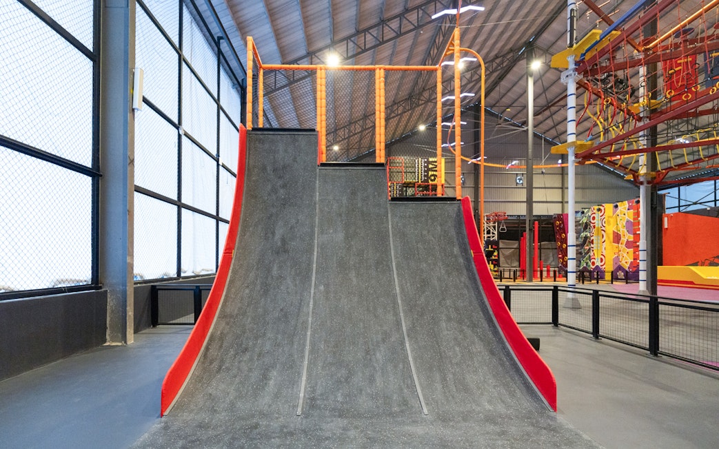 Indoor extreme park ramp at Monkey Canopy Resort.