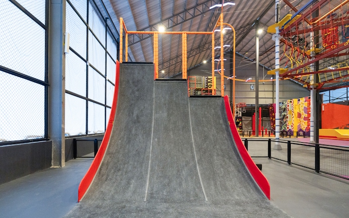 Indoor extreme park ramp at Monkey Canopy Resort.