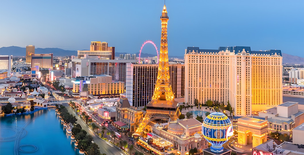 Eiffel Tower replica illuminated at night on Las Vegas Strip, USA.