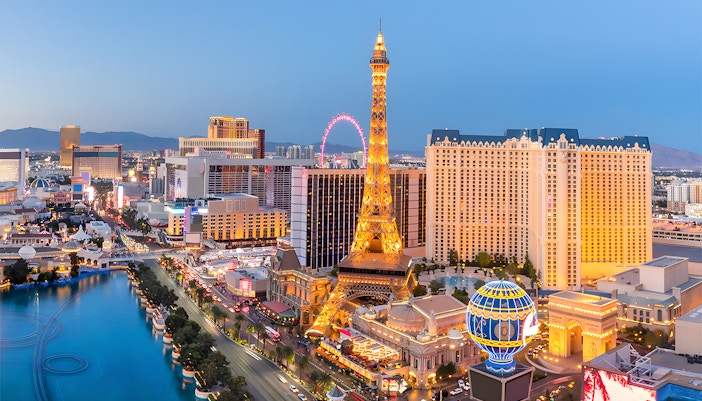 Eiffel Tower replica illuminated at night on Las Vegas Strip, USA.