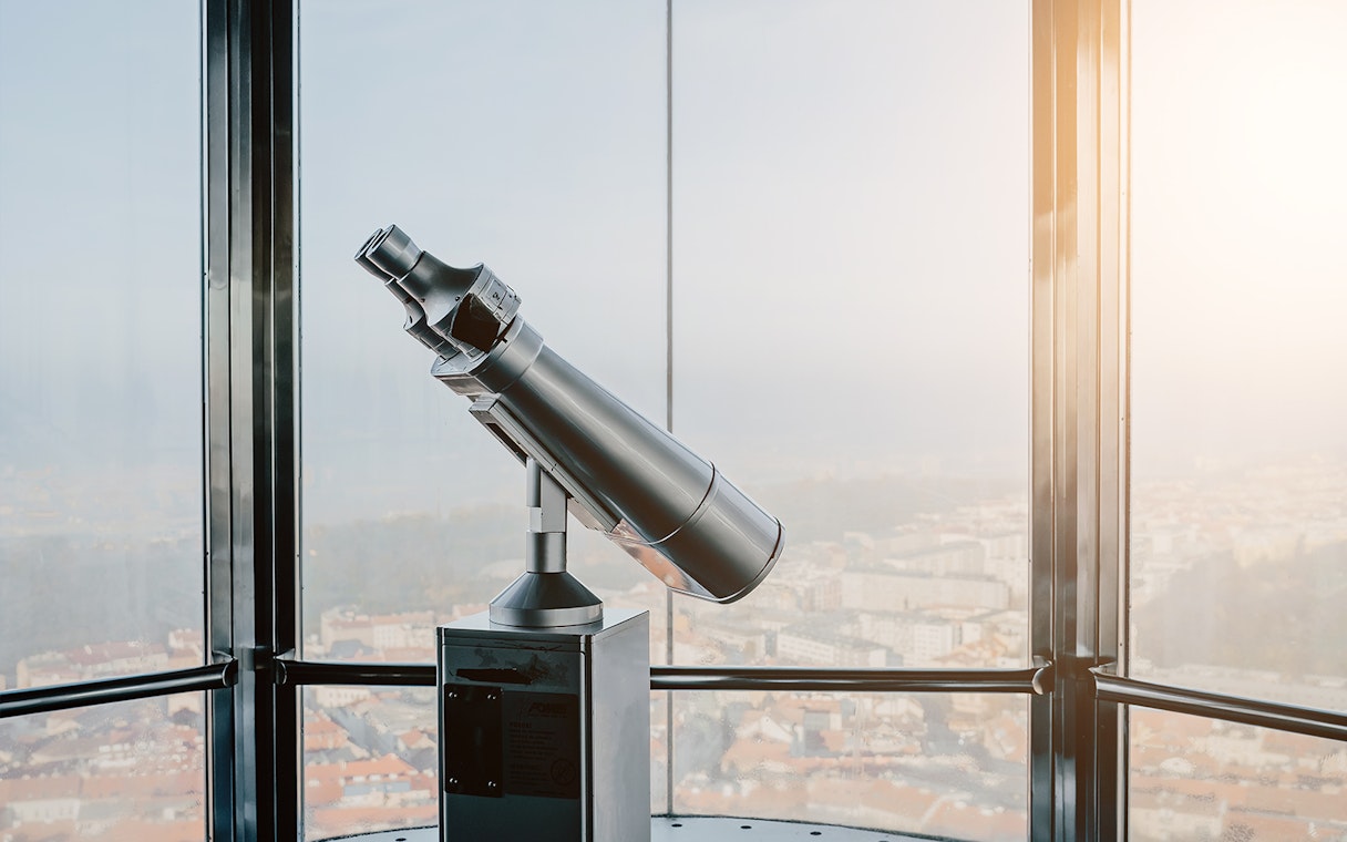 Telescope on observation deck in Zizkov Television Tower, Prague.