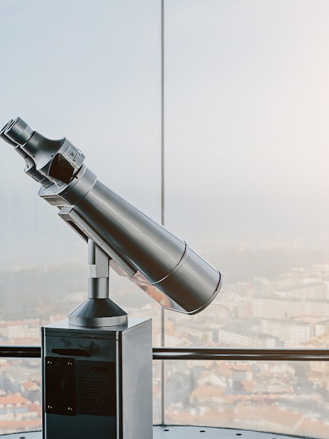 Telescope on observation deck in Zizkov Television Tower, Prague.