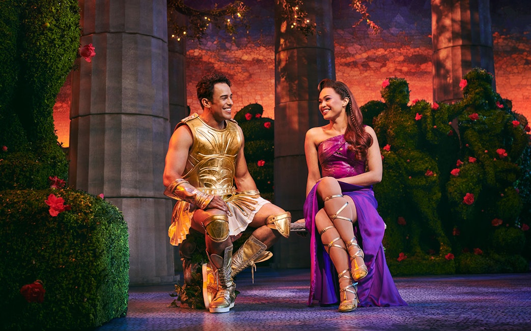 Hercules and Megara in costume during Disney's Hercules stage performance.