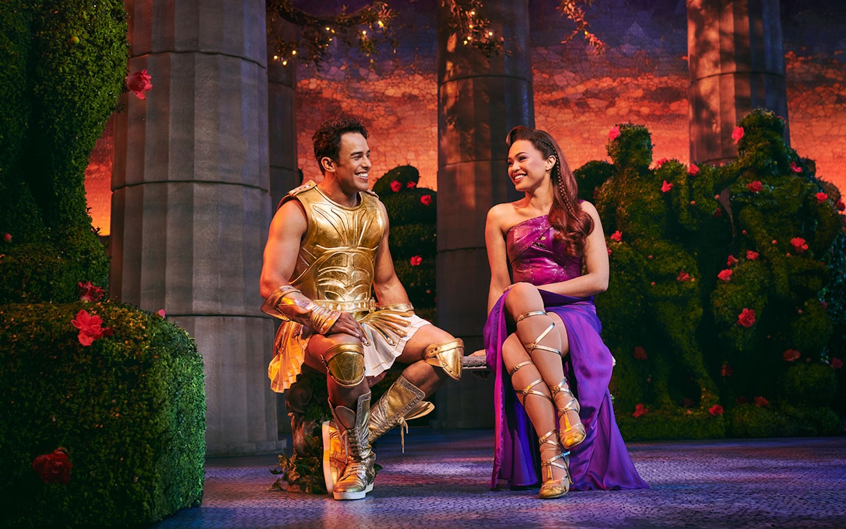 Hercules and Megara in costume during Disney's Hercules stage performance.