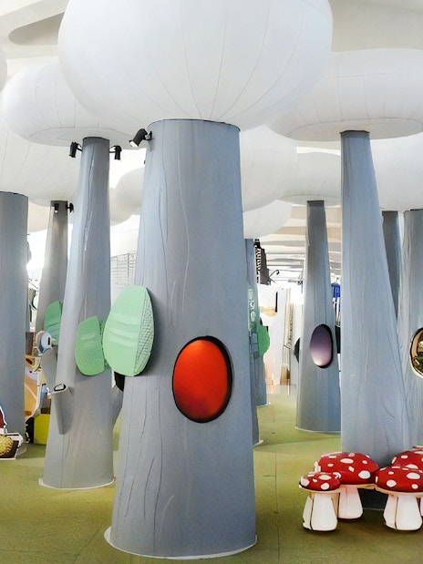 Interactive exhibit with large tree structures at Príncep Felipe Science Museum.