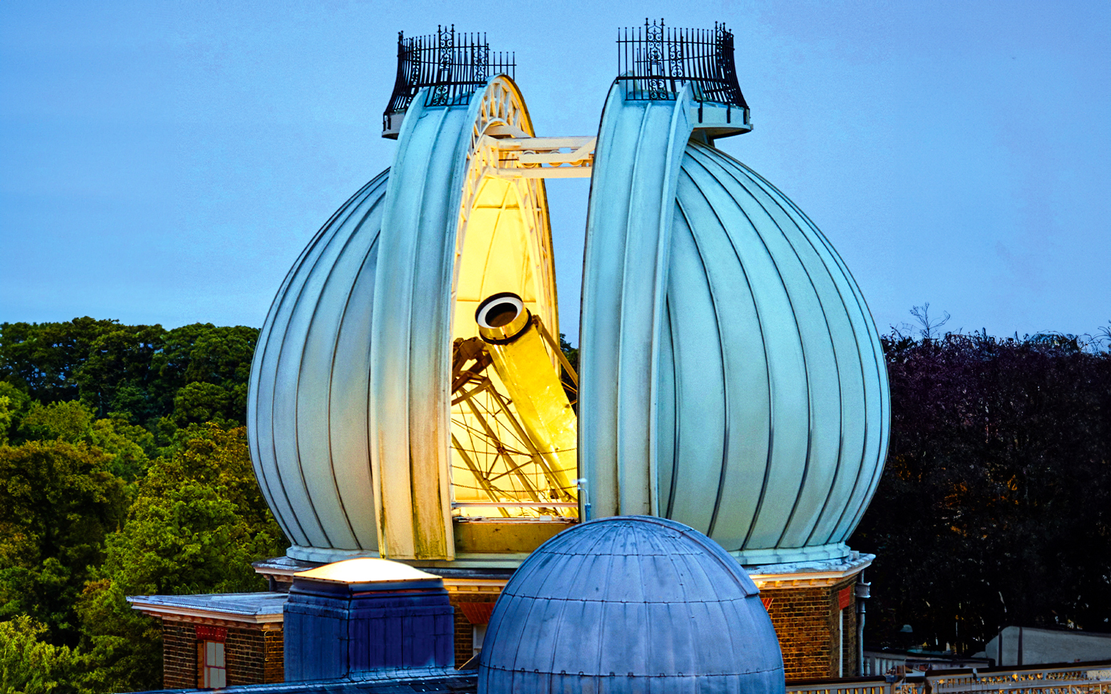 Observatory dome with telescope at Royal Greenwich Observatory, London.