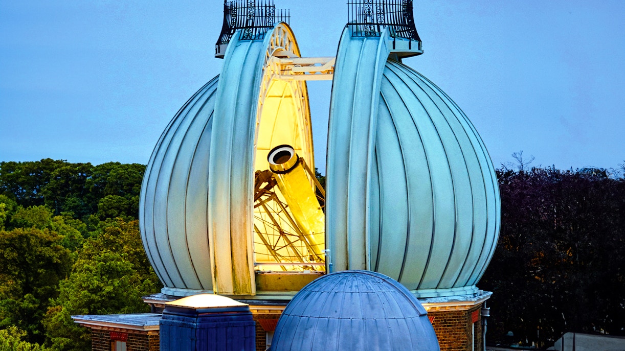 Observatory dome with telescope at Royal Greenwich Observatory, London.