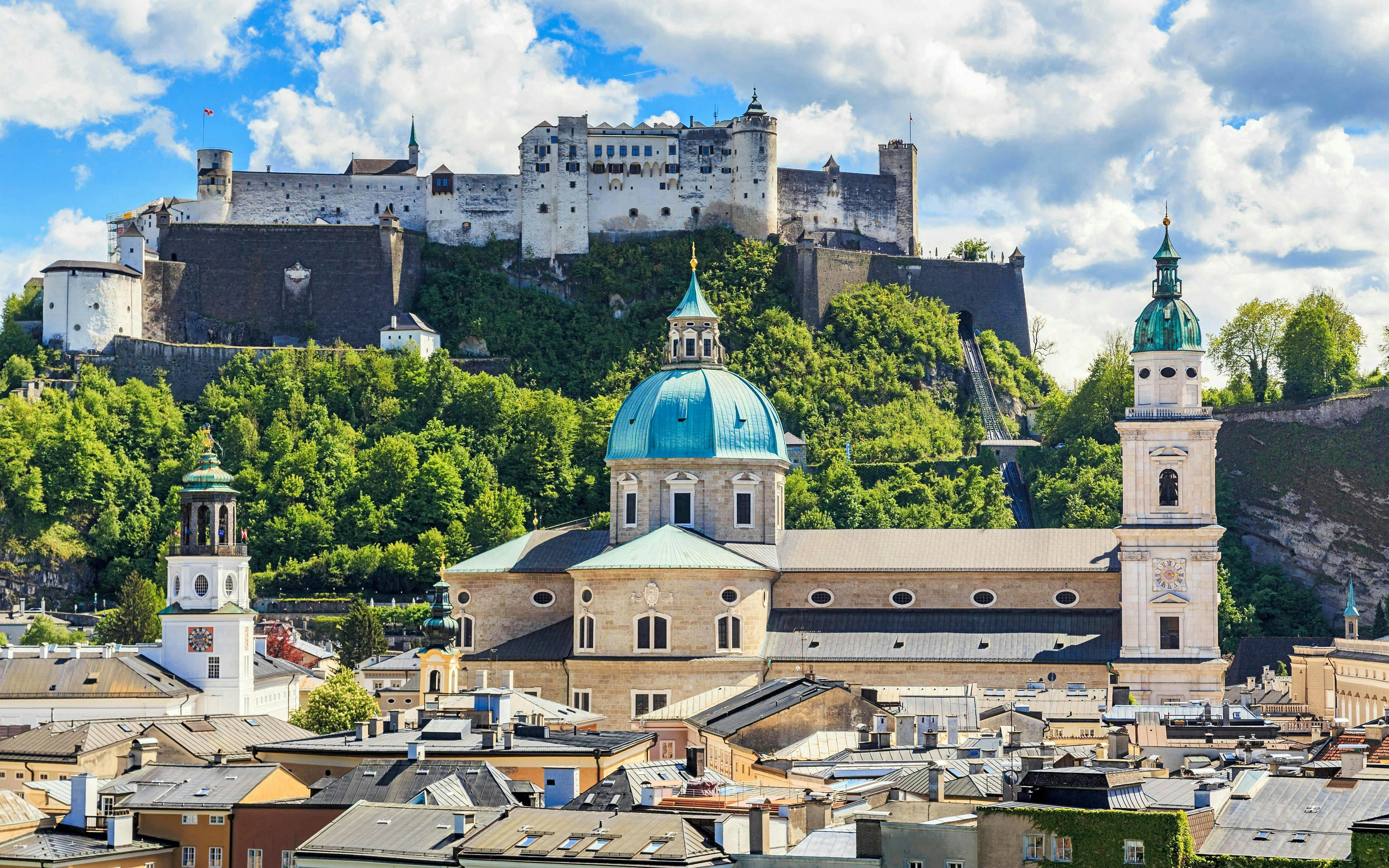Hohensalzburg Fortress overlooking Salzburg cityscape, Austria.