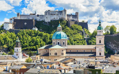 Hohensalzburg Fortress overlooking Salzburg cityscape, Austria.