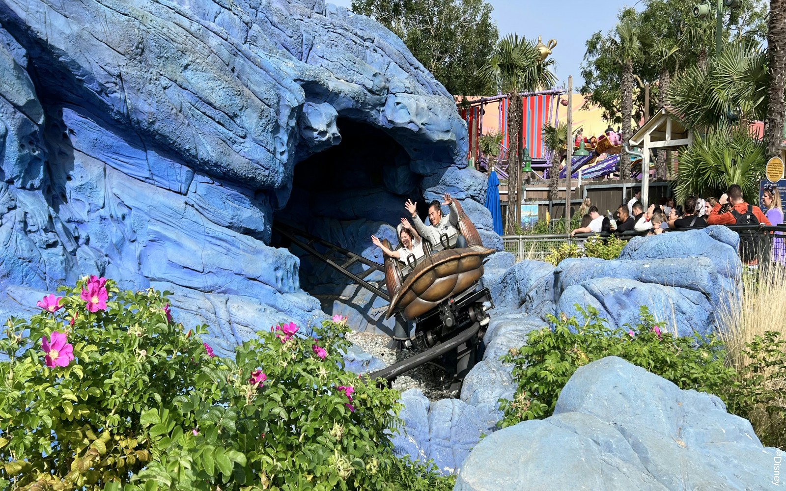 Visitors enjoying a thrilling Crush’s Coaster ride at Walt Disney Studio, Paris.