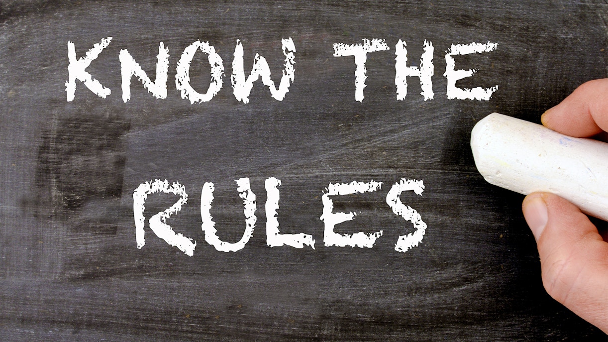 Know the rules" written on a chalkboard.