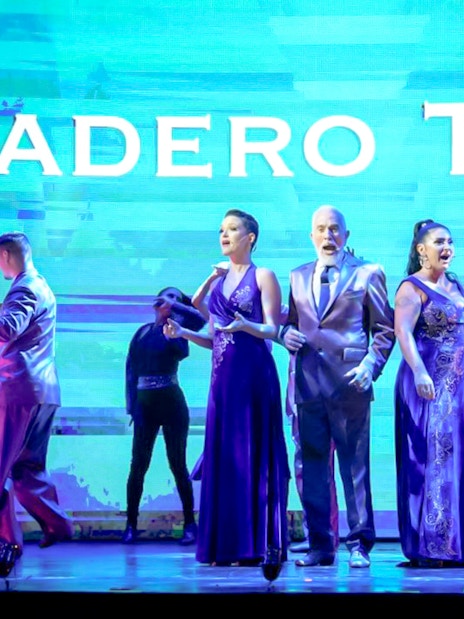 Performers dancing on stage at Madero Tango Show in Buenos Aires.