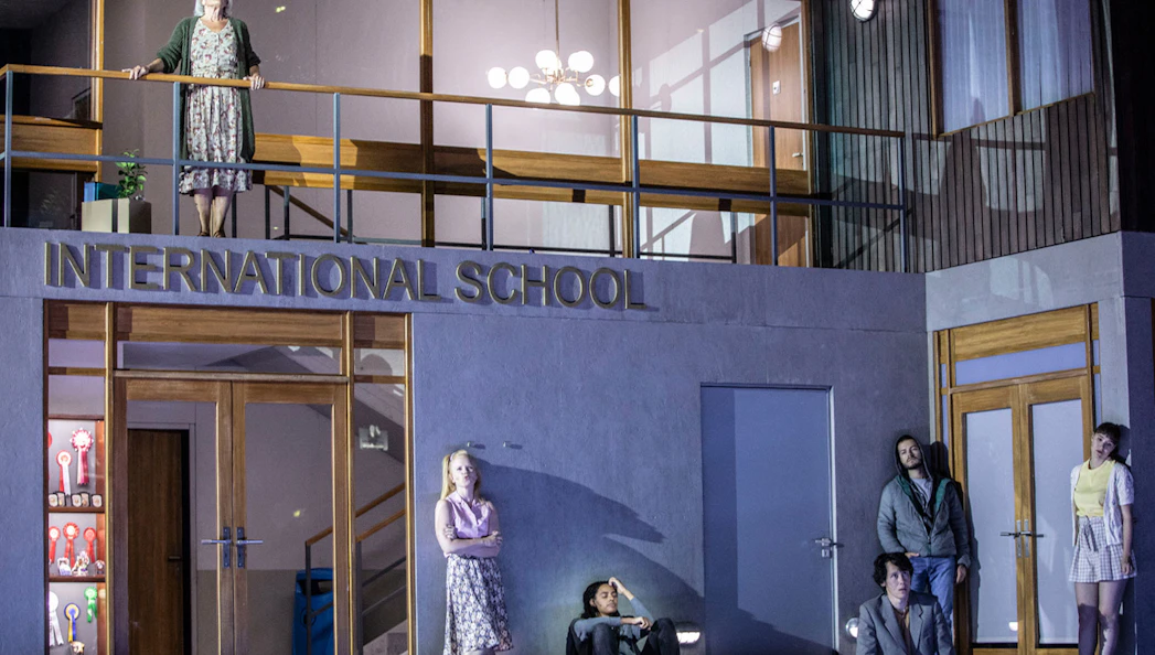 Scene from "Innocence" Broadway show at an international school setting.