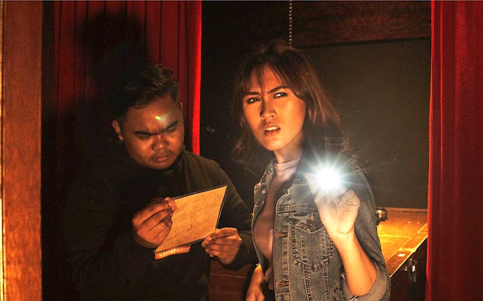 Participants solving clues in Breakout Escape Game Malaysia.