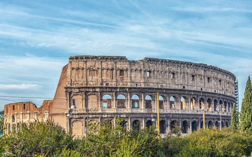Colosseum view from Domus Aurea park area in Rome, Italy.