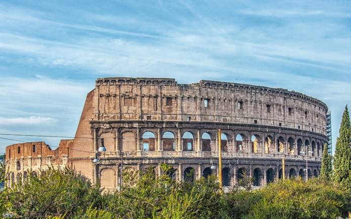 Colosseum view from Domus Aurea park area in Rome, Italy.