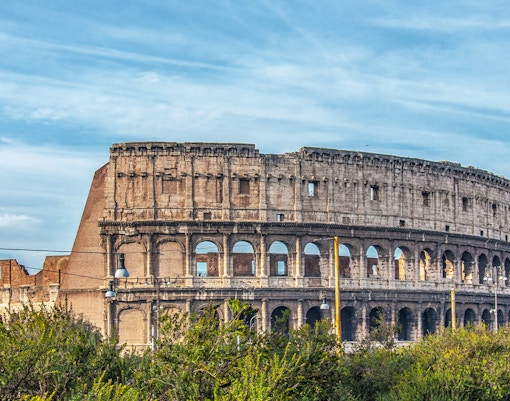 Colosseum view from Domus Aurea park area in Rome, Italy.