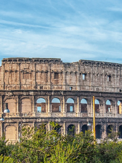 Colosseum view from Domus Aurea park area in Rome, Italy.