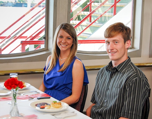 Guests sitting for brunch in the Steamboat Natchez