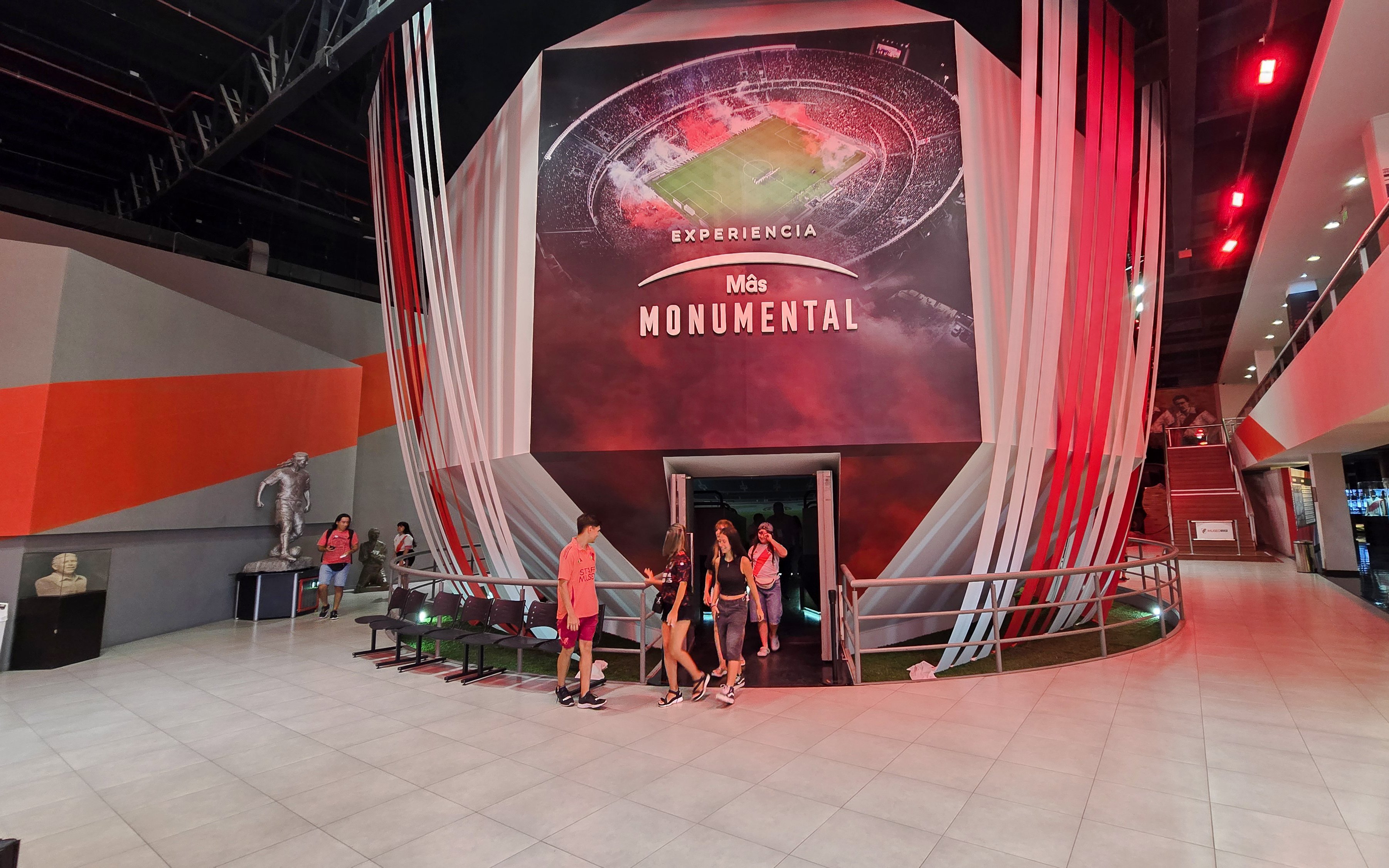 Inside the River Plate Museum at Estadio Mâs Monumental, Buenos Aires, with visitors exiting.