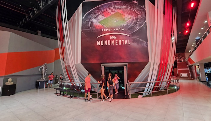 Inside the River Plate Museum at Estadio Mâs Monumental, Buenos Aires, with visitors exiting.