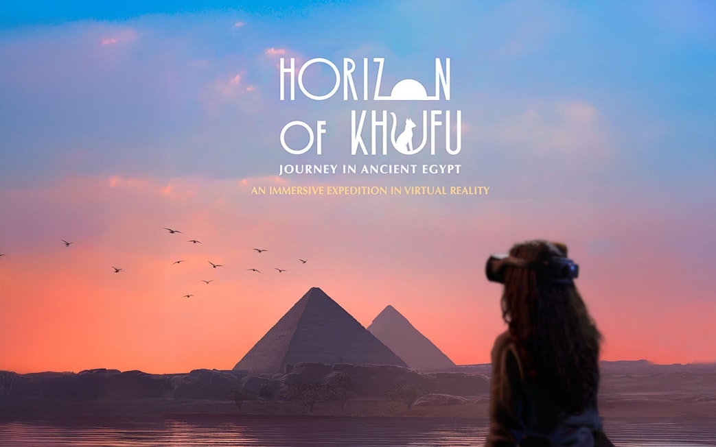 Virtual reality user viewing pyramids at sunset, Horizon of Khufu experience.
