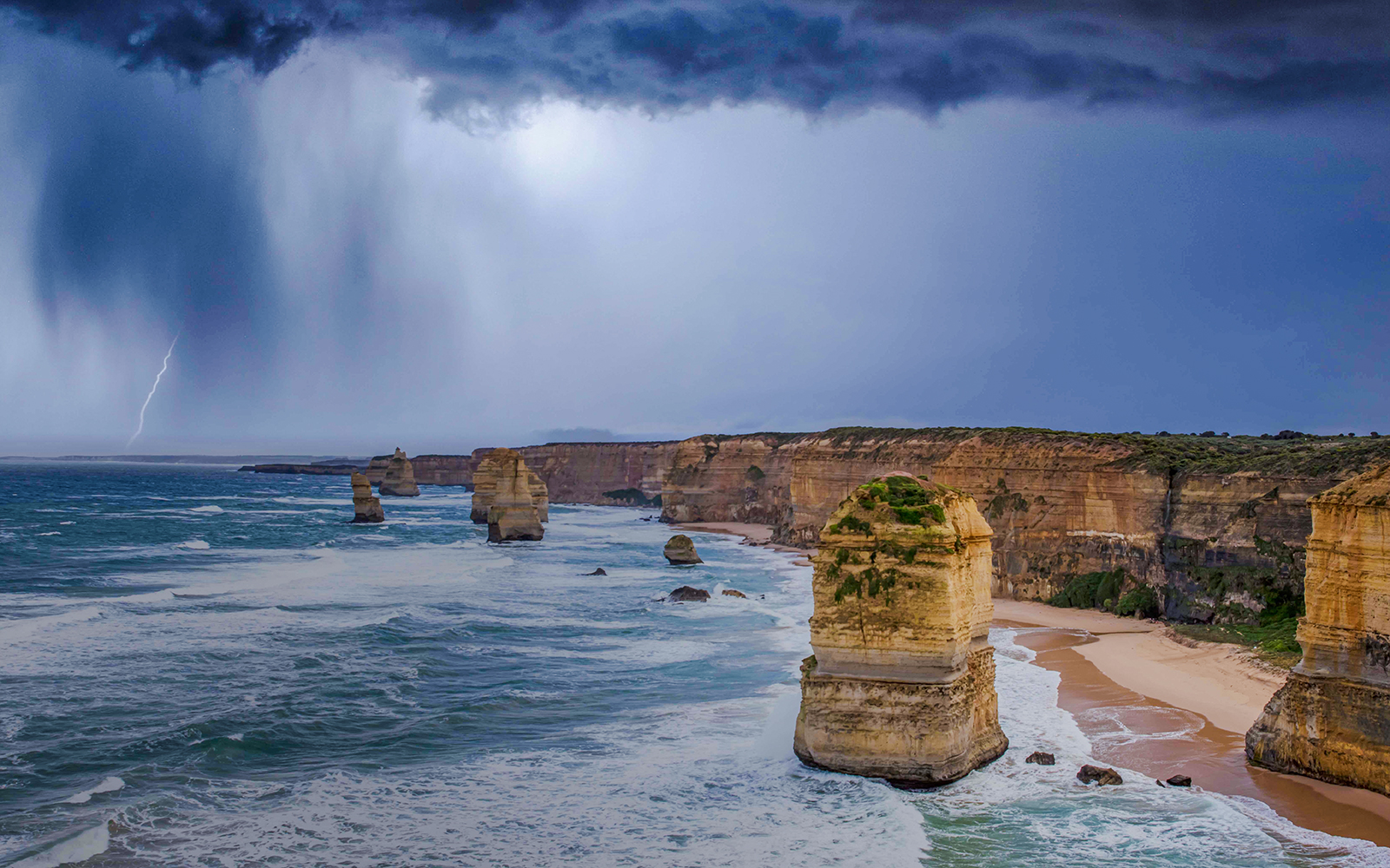 Twelve Apostles along Great Ocean Road during a storm.