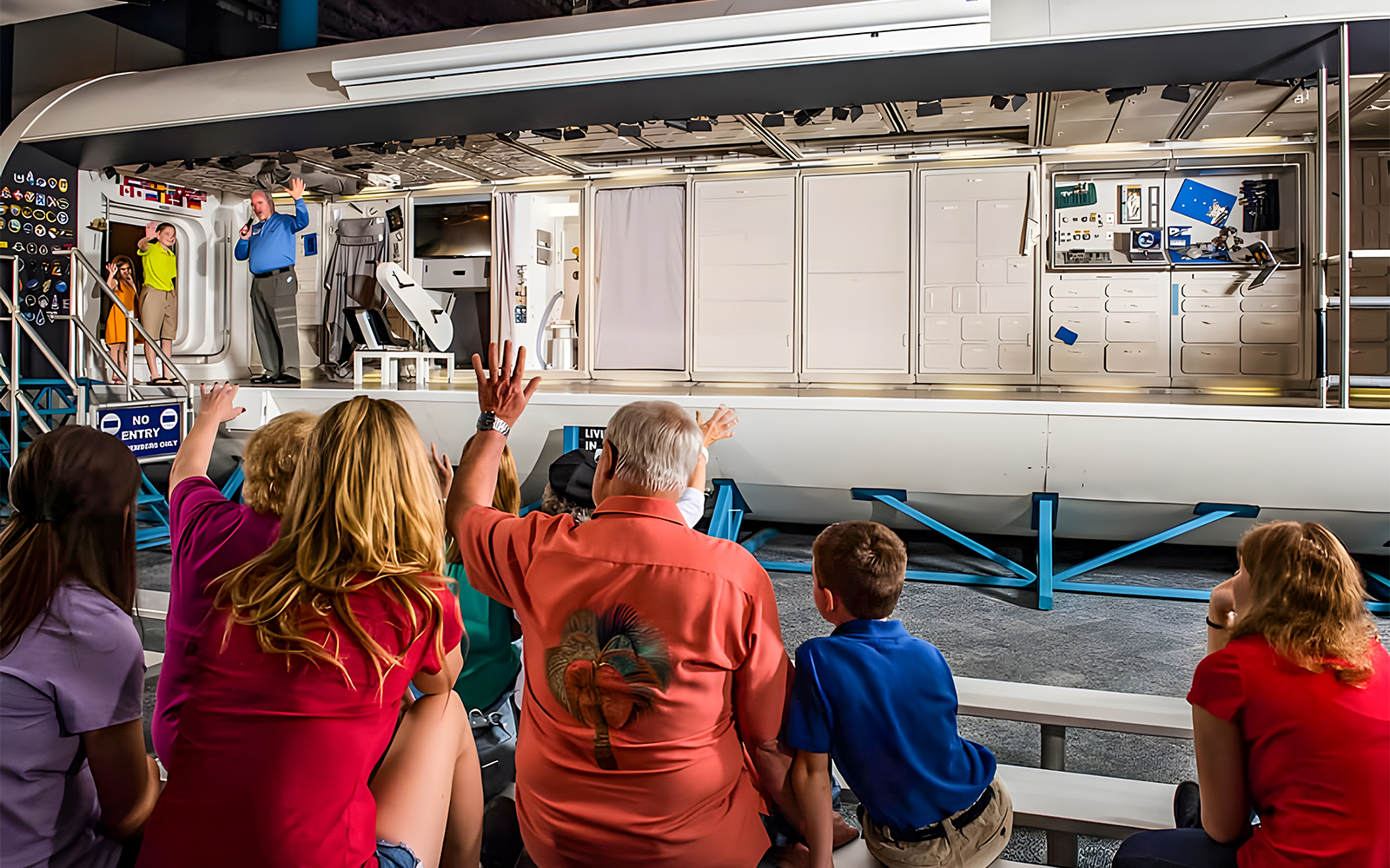 Staff giving presentations to guests at Houston Space Center