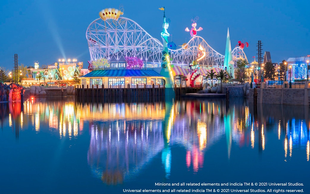 Roller coaster and colorful lights at Minion Land, Universal Studios Beijing, China.