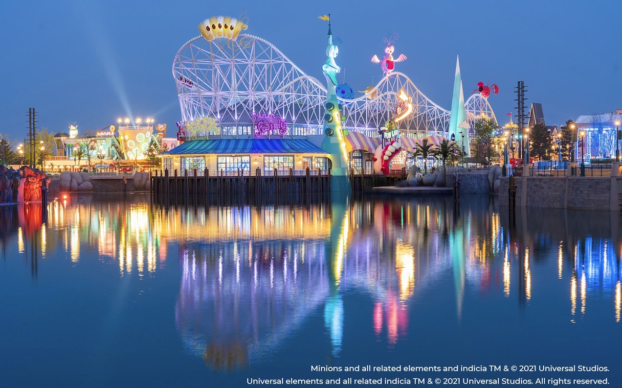 Roller coaster and colorful lights at Minion Land, Universal Studios Beijing, China.