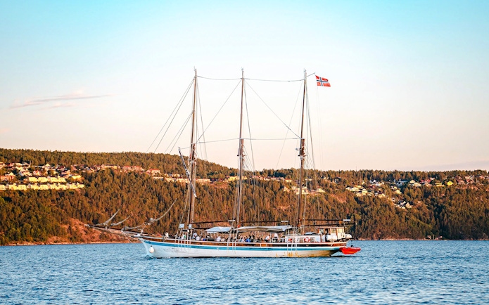 Sailing ship S/S Christiania on Oslofjord during summer evening cruise, Oslo.