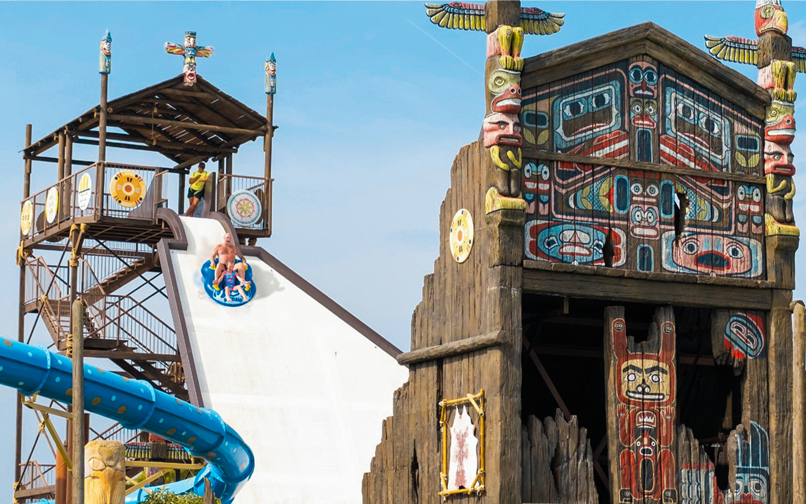 Boomerang water slide at Western Water Park with totem pole decor.