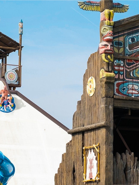 Boomerang water slide at Western Water Park with totem pole decor.